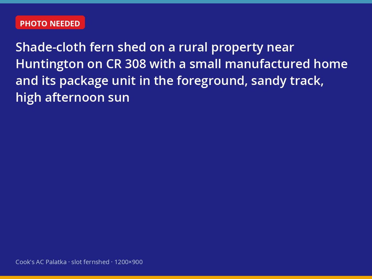 Manufactured home with a package air conditioner beside a fern shade house near Huntington