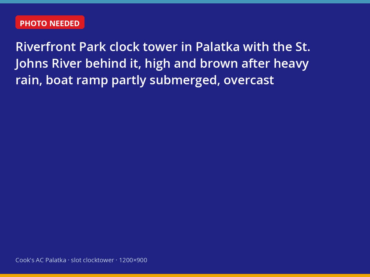 Riverfront Park clock tower beside a swollen St. Johns River in Palatka