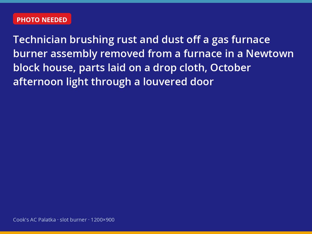 Cleaning gas furnace burners during a fall maintenance visit in Newtown, Palatka